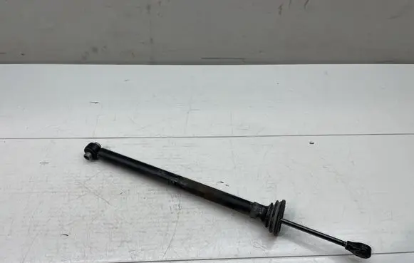 Front door check strap stopper