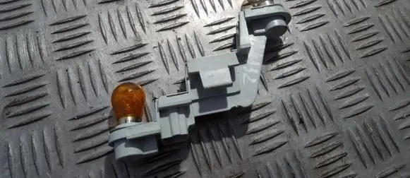 Volvo V50 Tail light bulb cover holder