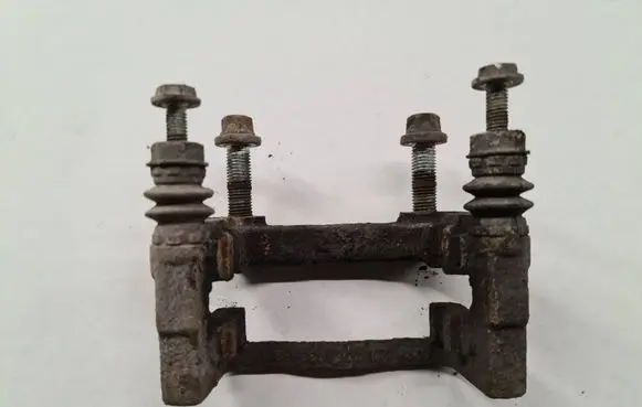 Opel Zafira B Brake caliper pad carrier rear 