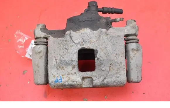 Opel Frontera B Front brake caliper 