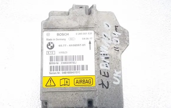 BMW 1 E81 E87 Airbag control unit/module 6930597 0285001531