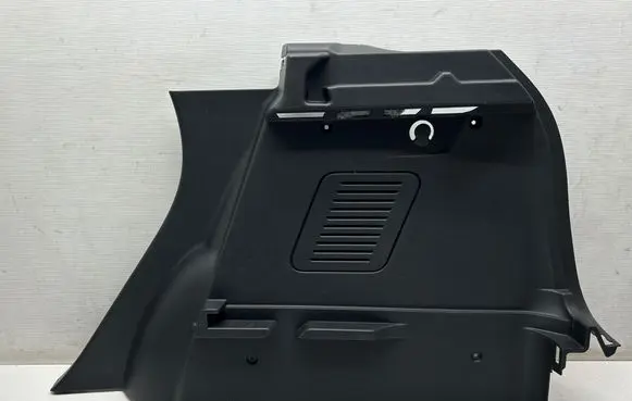 Trunk/boot lower side trim panel