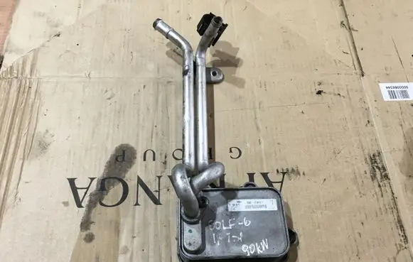 Volkswagen Golf VI Engine oil radiator 03C117021J