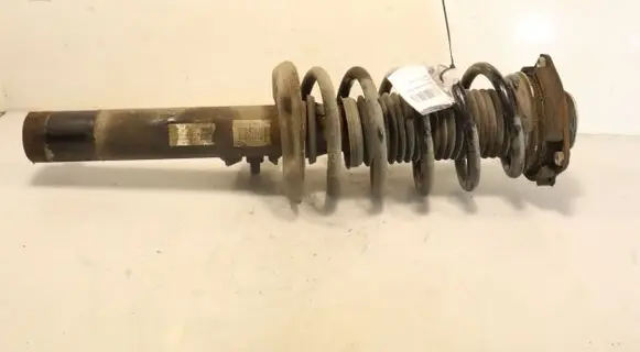 Volkswagen Caddy Front shock absorber with coil spring