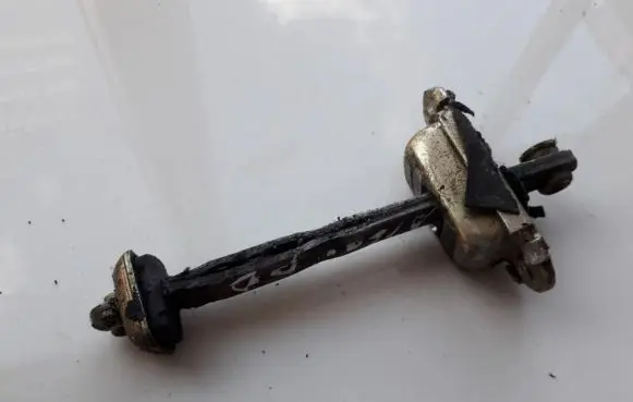 KIA Clarus Front door check strap stopper 