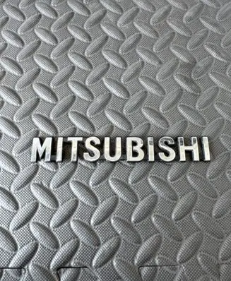 Mitsubishi Outlander Manufacturers badge/model letters 7415A479