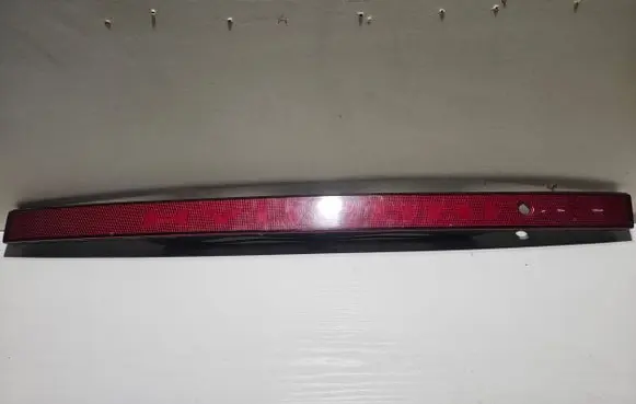Trunk door license plate light bar