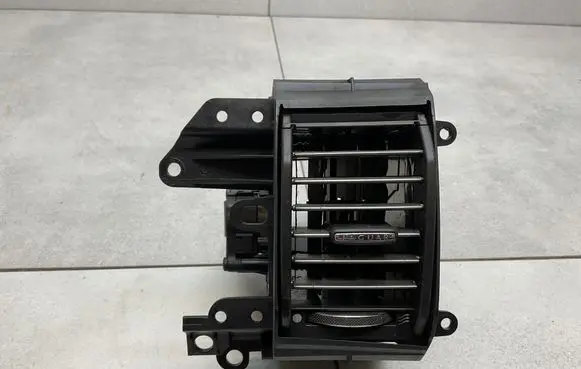 Jaguar XF X250 Dash center air vent grill 8X2319K617AJ