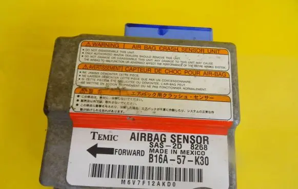 Mazda 323 F Airbag control unit/module B16A-57-K30