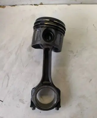 Piston with connecting rod