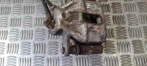 Nissan Note (E11) Front brake caliper