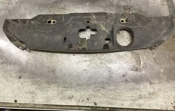 Engine bonnet/hood lock trim molding