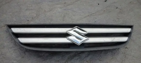 Suzuki Liana Front bumper upper radiator grill 7211154GB0