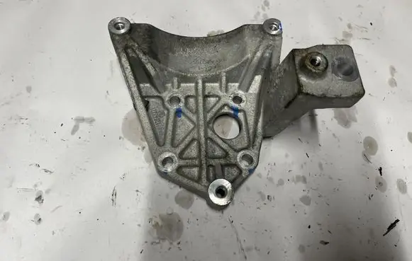 Chevrolet Camaro A/C compressor mount bracket 12643221