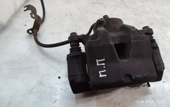 Hyundai Tucson TL Front brake caliper