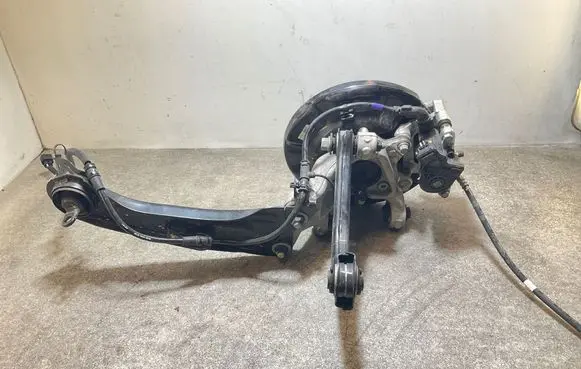 Rear wheel hub spindle/knuckle
