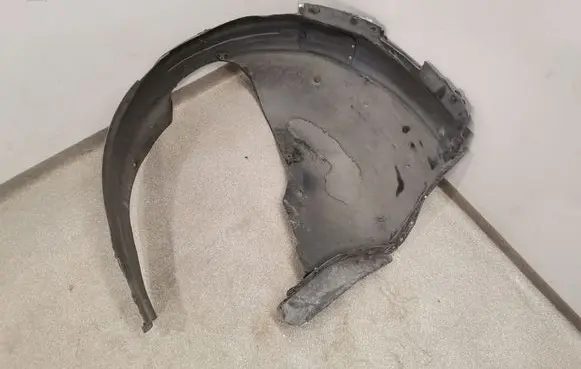 Front wheel arch liner splash guards