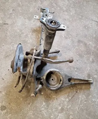 Rear wheel hub spindle/knuckle