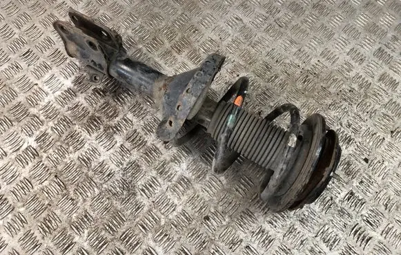 Subaru Legacy Front shock absorber with coil spring