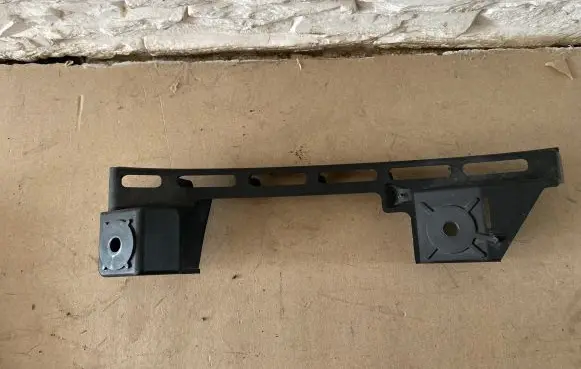 Volkswagen Caddy Front bumper mounting bracket 1T0807889