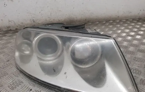 Volkswagen Touareg I Headlight/headlamp 7L6941016CE 89307881
