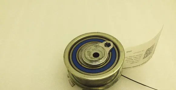 Volkswagen PASSAT B7 Belt tensioner pulley 03L109243C