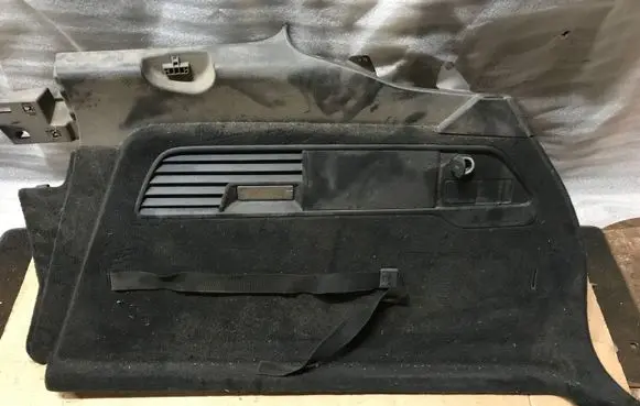 Trunk/boot lower side trim panel