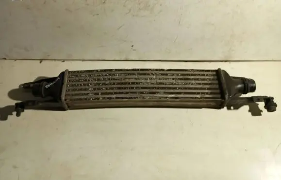 Opel Corsa D Intercooler radiator 55702004