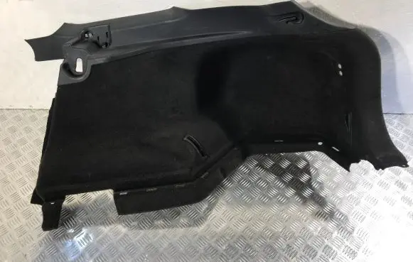 Trunk/boot lower side trim panel