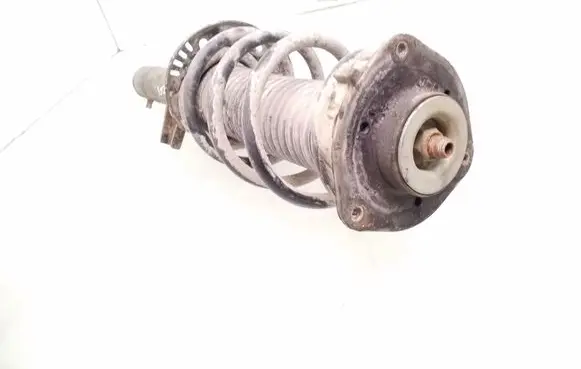 Volkswagen Caddy Front shock absorber with coil spring