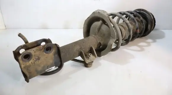 Suzuki SX4 Front shock absorber with coil spring
