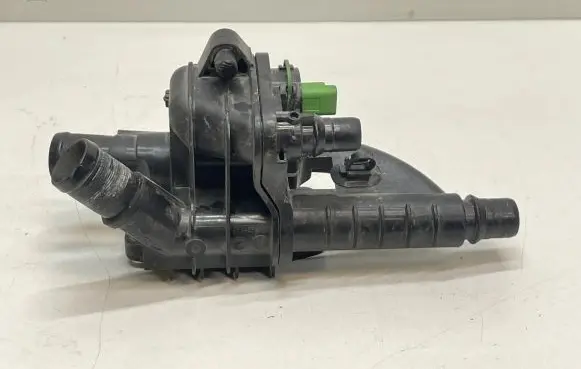 Thermostat/thermostat housing