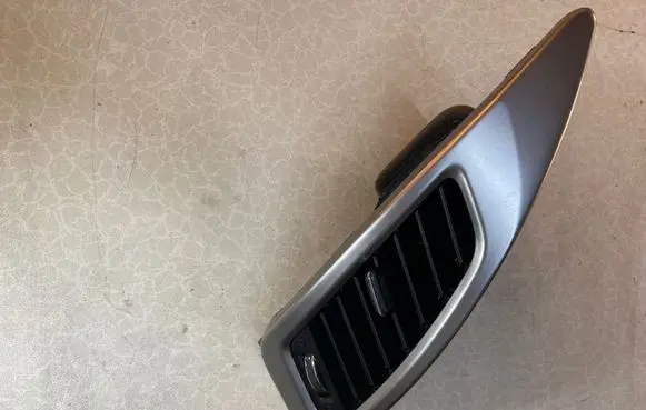 SsangYong Korando Dash center air vent grill 6961M34400