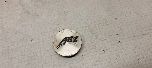 Volkswagen Golf V Original wheel cap YS1035N015 57MM AEZ