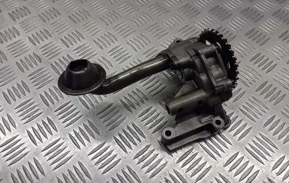 Volkswagen Golf IV Oil sump strainer pipe 06A115105B