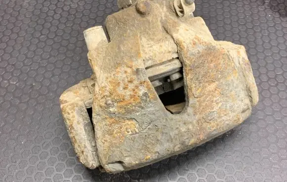 Opel Zafira B Front brake caliper 93176426