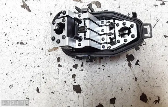 Tail light bulb cover holder