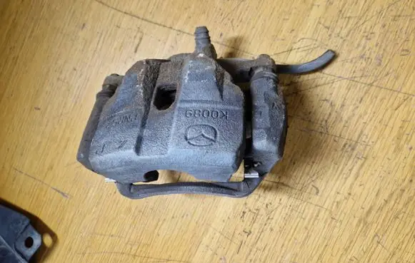 Mazda 6 Front brake caliper K0089