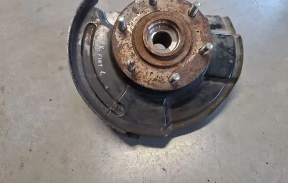 Front wheel hub spindle knuckle