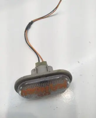Renault Kangoo I Front fender indicator light 7700847333
