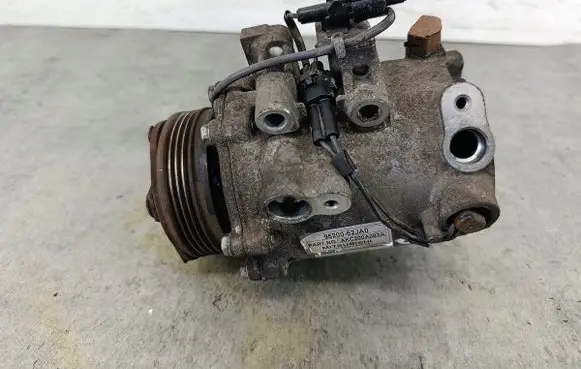 Suzuki Swift I Air conditioning (A/C) compressor (pump) 9520062JA0