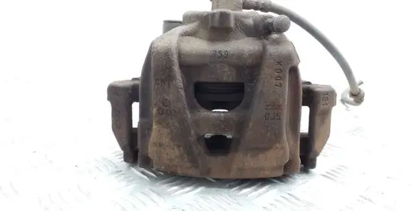 Volkswagen Tiguan Front brake caliper 759