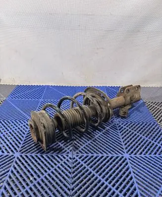 Nissan Leaf I (ZE0) Front shock absorber/damper
