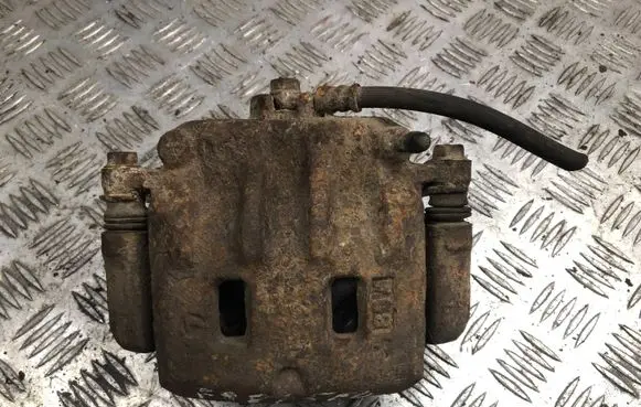Subaru Forester SF Front brake caliper
