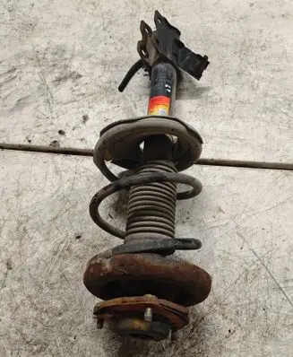 Nissan X-Trail T30 Front shock absorber with coil spring 757124 L24521 JGM1185T