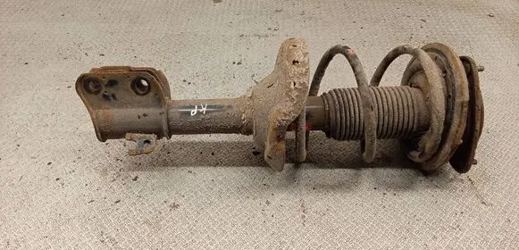 Subaru Legacy Front shock absorber with coil spring 