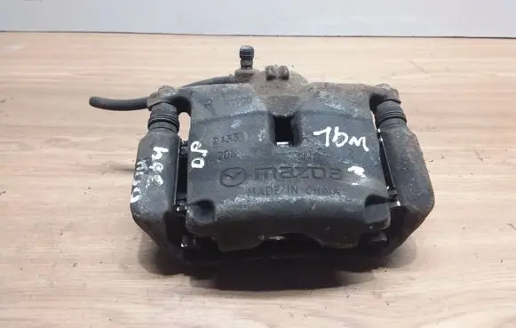 Mazda 3 II Front brake caliper