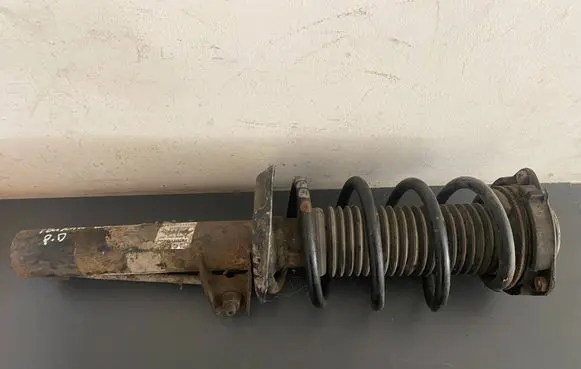 Volkswagen Touran II Front shock absorber with coil spring 1K0400054BS