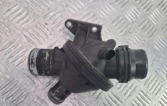 Thermostat/thermostat housing