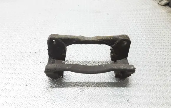 Suzuki Swift I Front Brake Caliper Pad/Carrier 